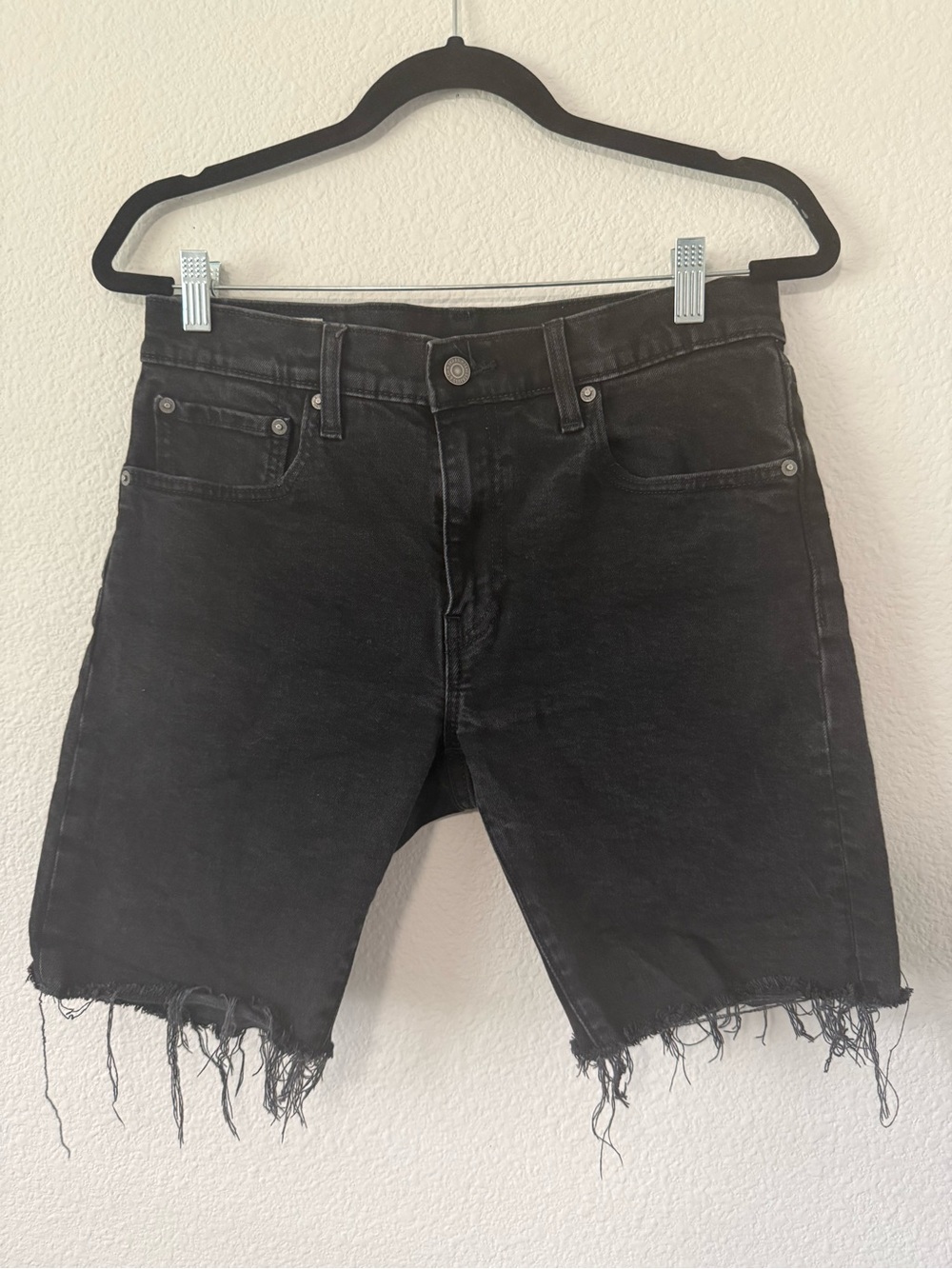 Levi's Black Distressed Denim Cutoff Shorts. PyS